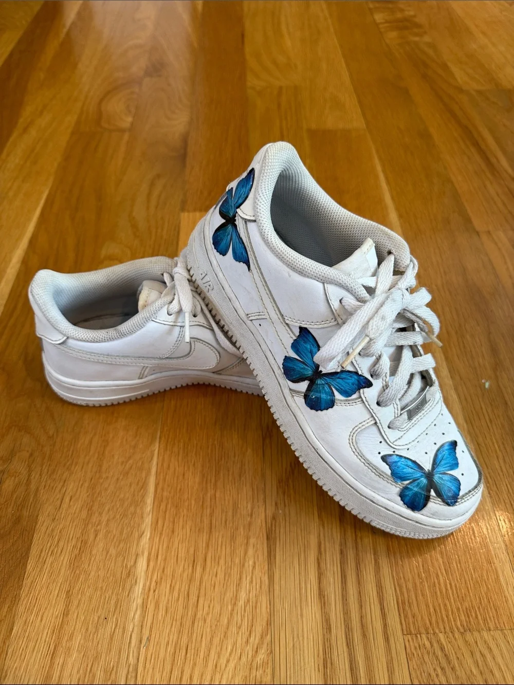 Nike Air Force One Sneakers with Blue Butterfly Accents